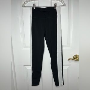 Express black and white striped leggings.